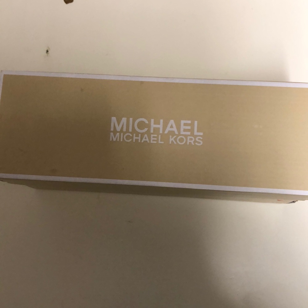 Black Michael Kors flip flops